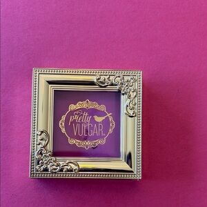 Pretty Vulgar Gold Frame with Purple Accent